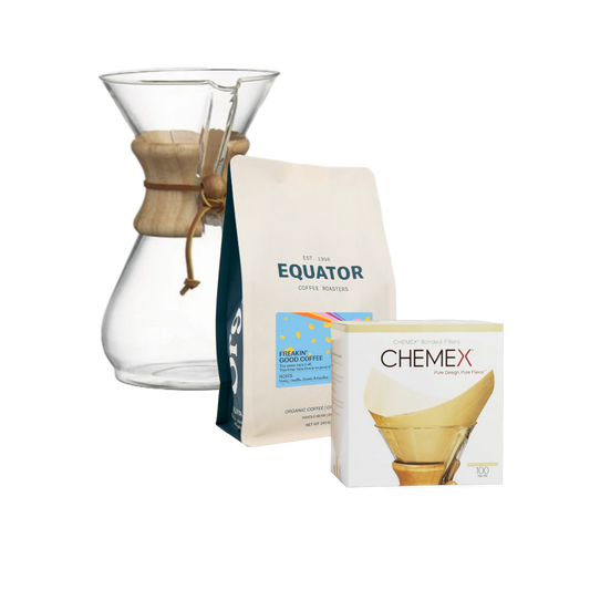 A Chemex coffee maker, filters and a bag of coffee.