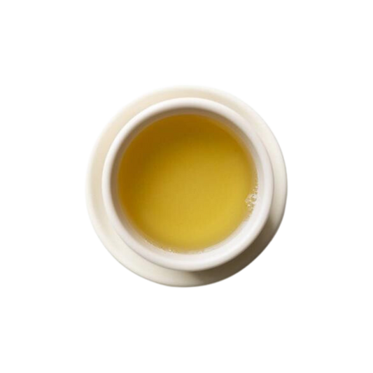 A cup of steeped Jade Cloud green tea.