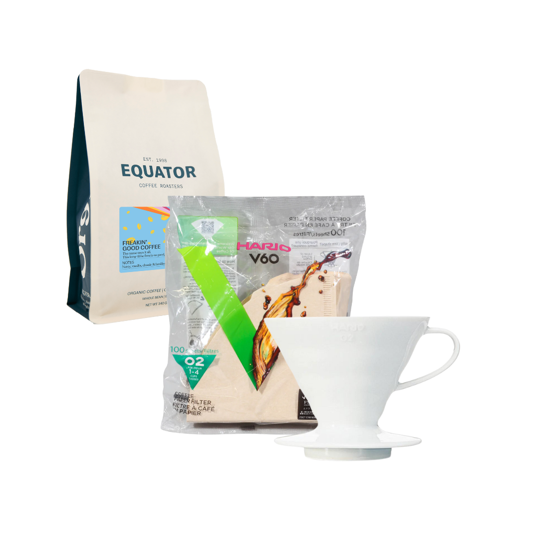 White ceramic V60, filters and a bag of Freakin' Good coffee.