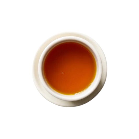 Cup of steeped turmeric ginger tea