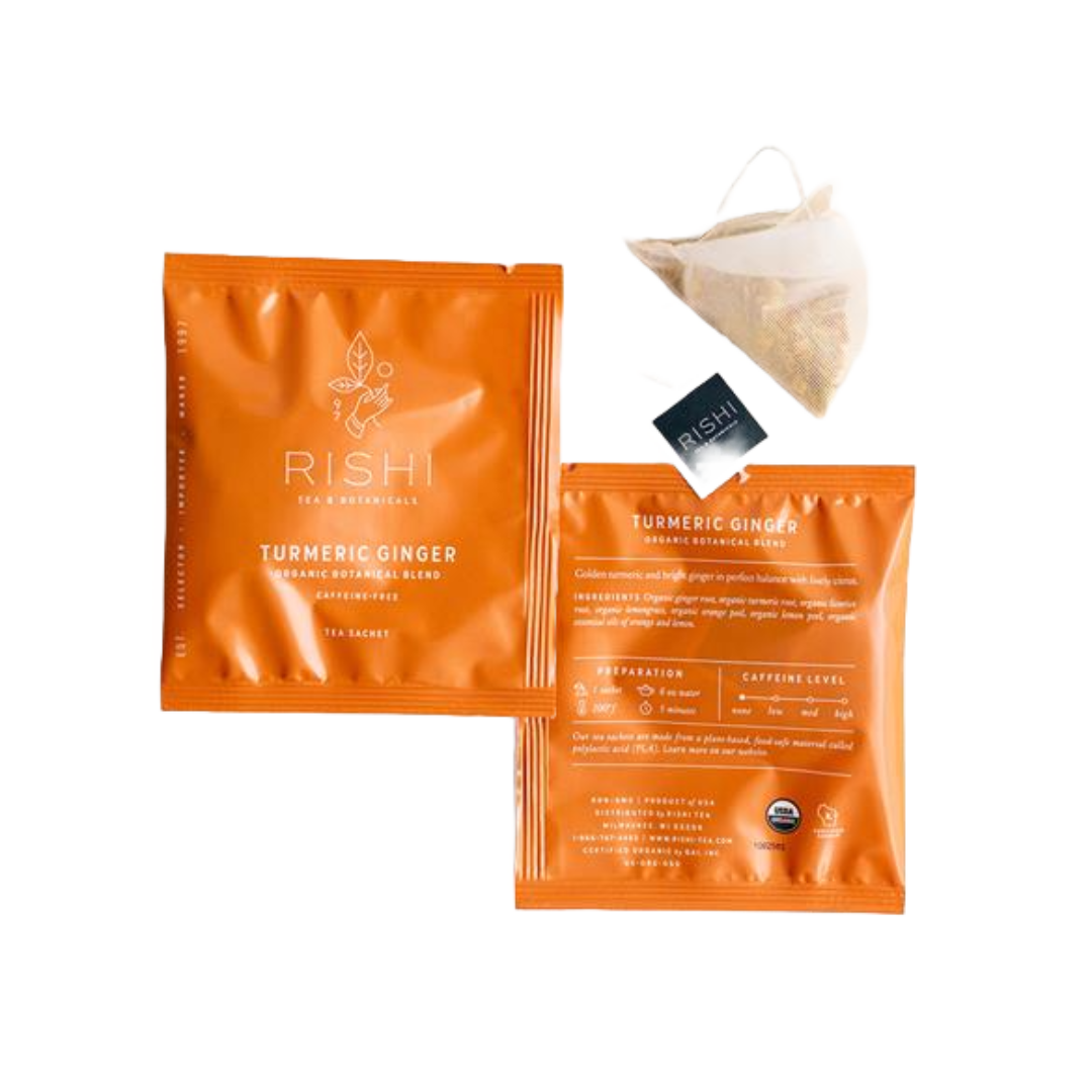 Two packages and a tea bag of Turmeric Ginger tea.