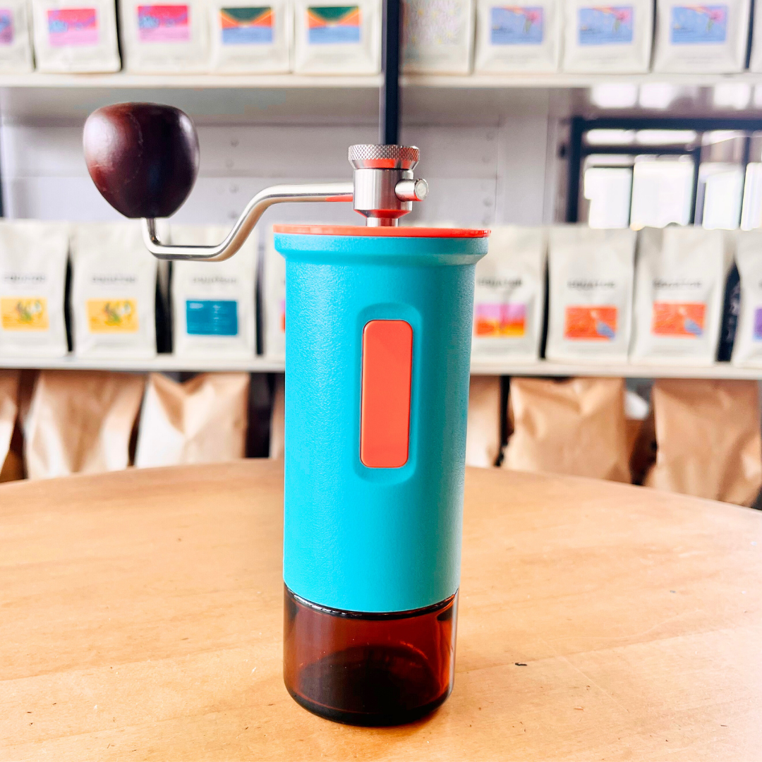 Light blue Maiwen manual coffee grinder.