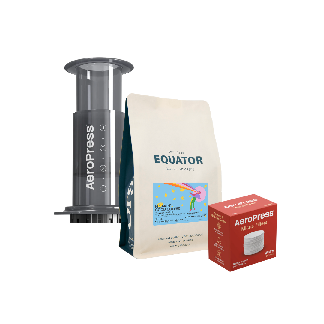 Aeropress Original brewer with a bag of coffee and a box of filters.