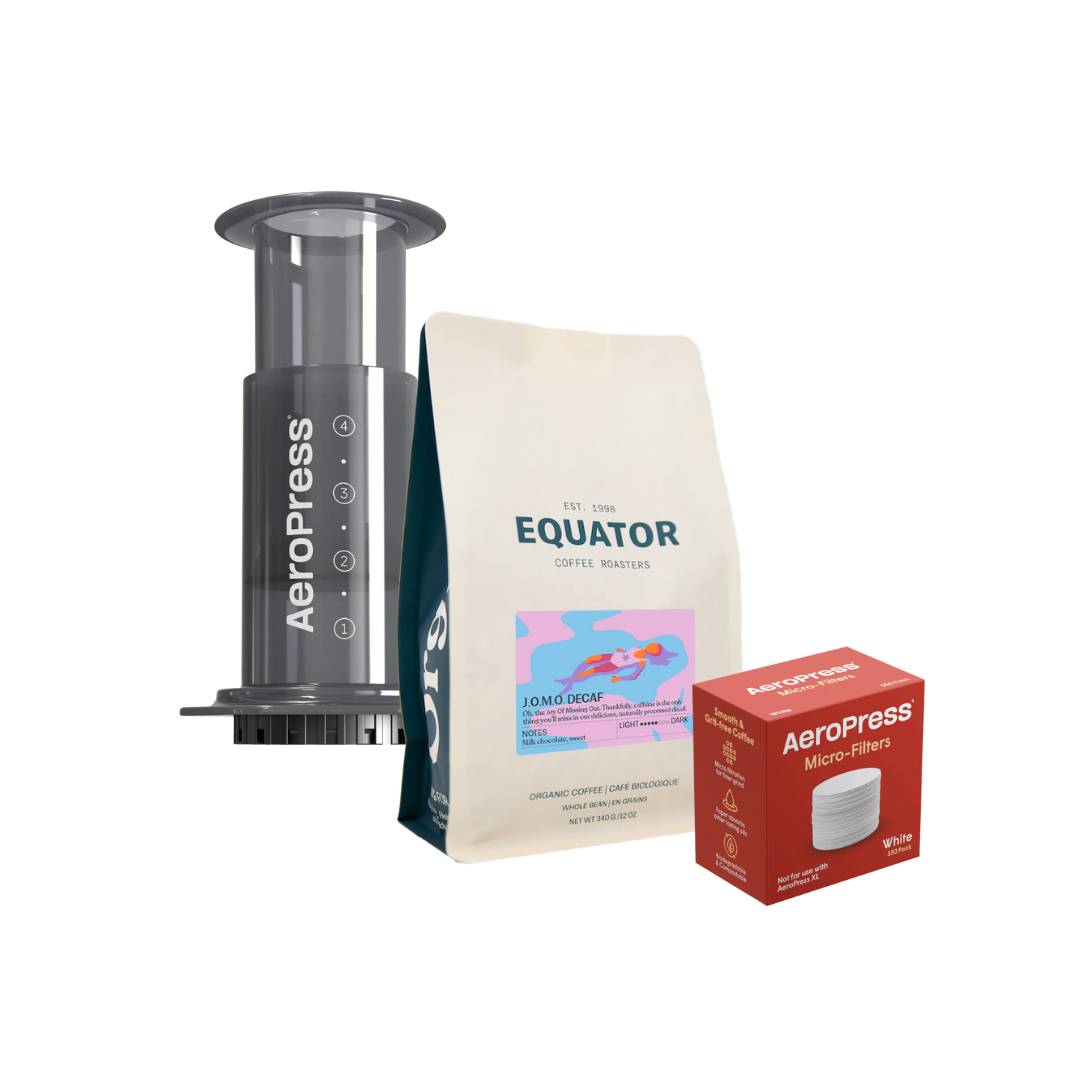 A bag of decaf coffee and an AeroPress and filters.