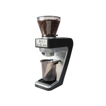 Coffee grinder with the hopper at the top full of coffee beans.