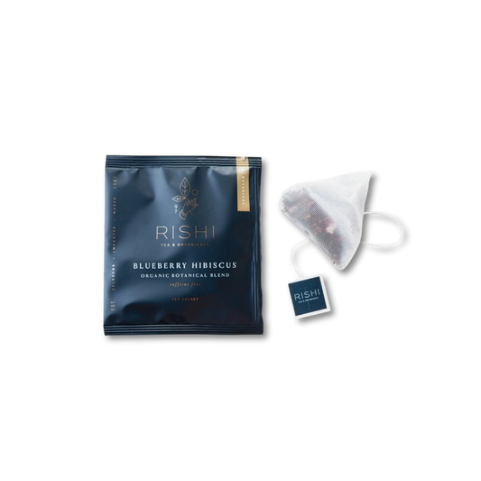 Rishi Tea Blueberry Hibiscus tea package and triangle tea bag