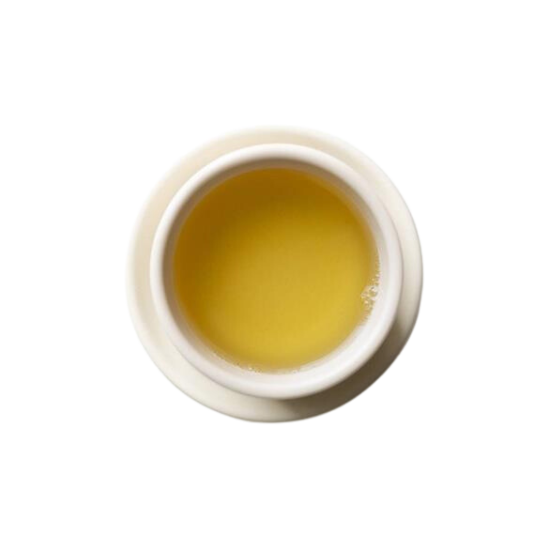 A cup of steeped Jade Cloud green tea.