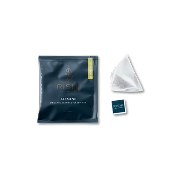 Jasmin Green tea package and tea bag beside it
