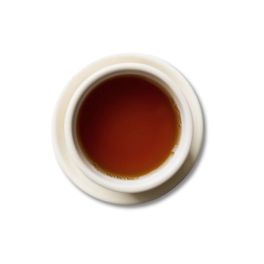 White teacup with steeped Masala Chai tea