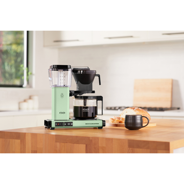 Pistachio coloured Moccamaster KBGV coffee maker on a kitchen counter