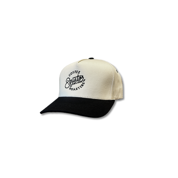 Equator Coffee Roasters embroidered on a white hat with black brim.