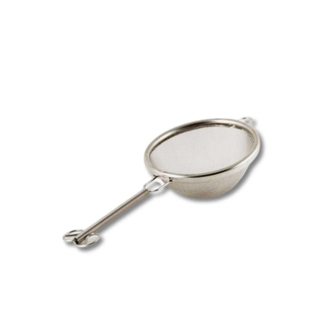 Small stainless steel sifter with a handle for sifting matcha powder.