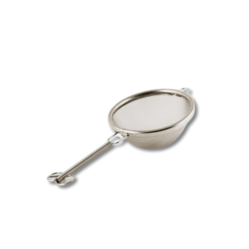Small stainless steel sifter with a handle for sifting matcha powder.