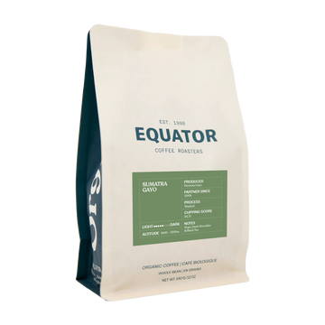 A 340g bag of Equator Coffee Roasters Sumatra Gayo organic coffee, featuring a cream-colored bag with a dark teal side panel and a green label block.