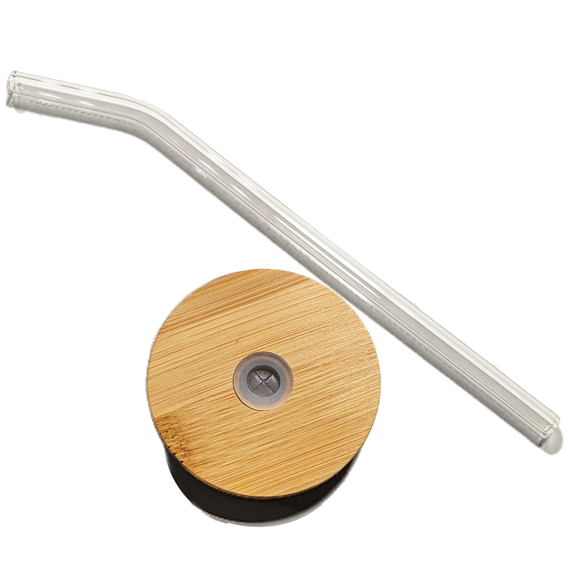 Top down view of the bamboo lid and a glass straw beside it.