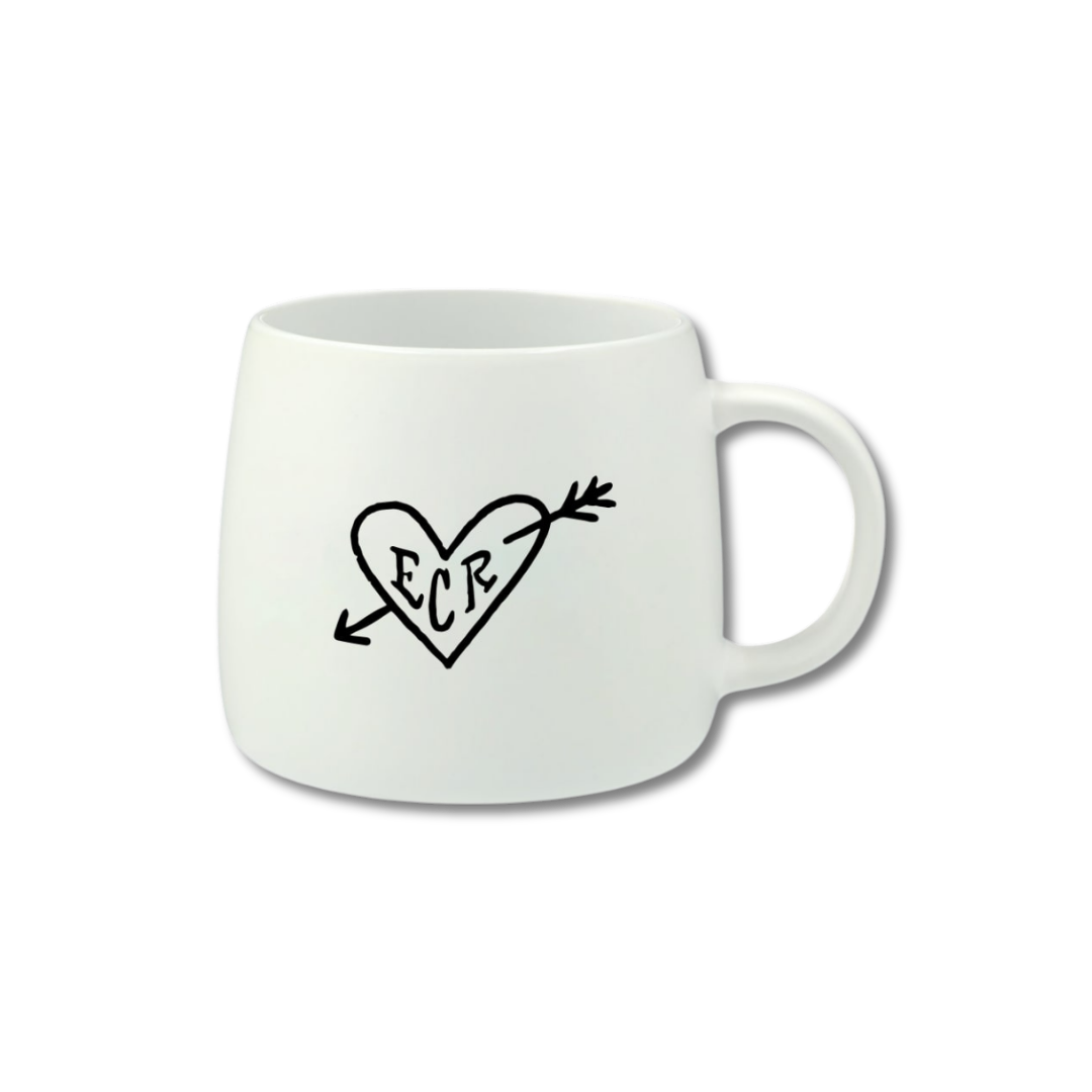 15oz white ceramic mug with a heart and arrow design
