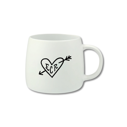 15oz white ceramic mug with a heart and arrow design