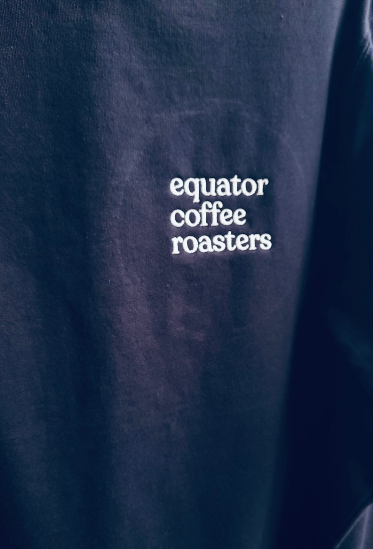 Closeup of embroidered Equator Coffee Roasters