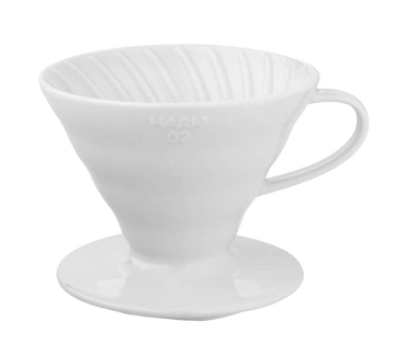 White ceramic Hario V60-02 coffee dripper.