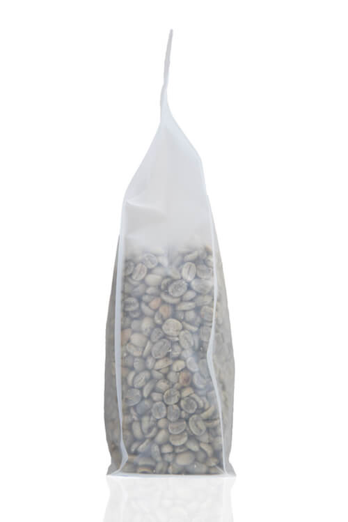 Side view of a 454g bag of Guatemalan green coffee beans.